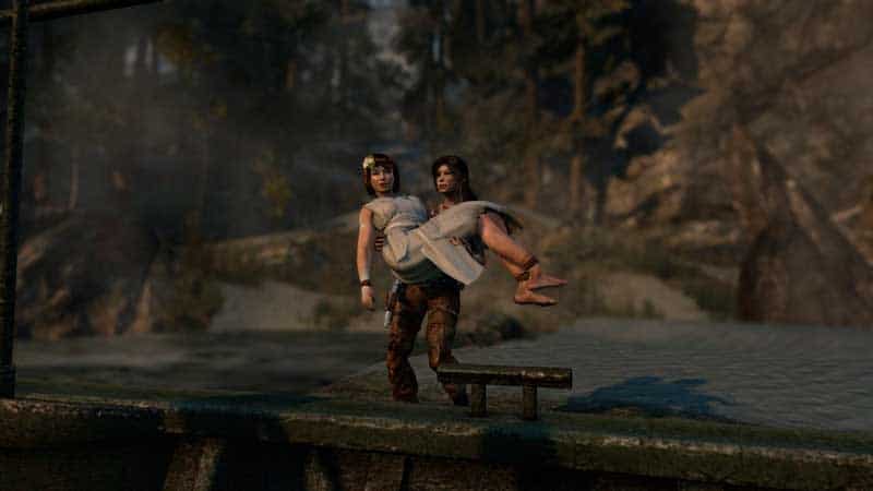 Lara Croft cargando a Sam